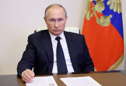Russia's President Putin meets with Novosibirsk Region Governor Travnikov
