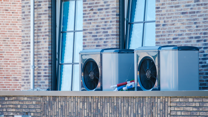 Air Source Heat Pump Installation on Modern Home Exterior