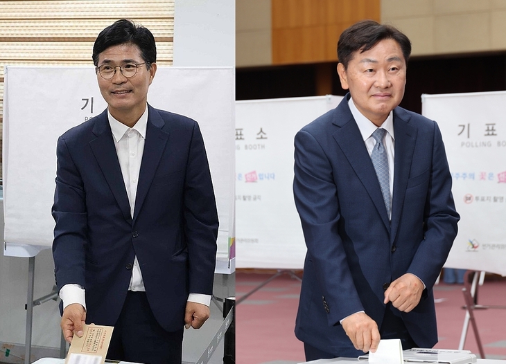 이원택 더불어민주당 전북특별자치도지사 후보(왼쪽)와 김관영 무소속 후보가 29일 사전 투표하는 모습. 사진 = 연합뉴스