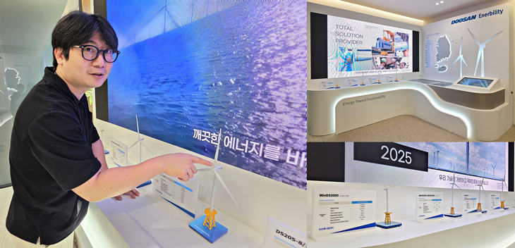최인욱 두산 윈드 파워 센터장이 1층 홍보 부스에서 자사 제품 모형을 가리키며 설명하는 모습. 사진=박규빈 기자