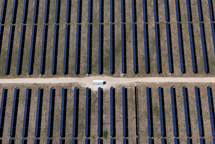 FILE PHOTO: An aerial view shows rows of solar panels at a solar farm in Anson, Texas